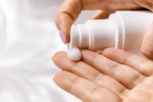 sunscreen on fingers